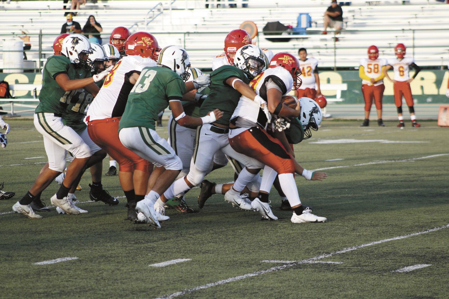 Dons gang tackle